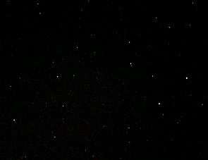 Saturn in western Leo, in a photograph taken on 14th January 2007. Saturn, at magnitude +0.2, is significantly brighter than Regulus (magnitude +1.3) - the brightest star in Leo. By opposition day on February 10th 2007, Saturn had brightened a little more to magnitude +0.0 (Click on the image for a full-screen photo)